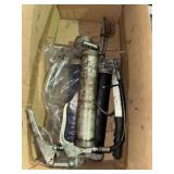 Box of grease guns