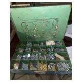 Green metal box full of hardware (nuts, bolts,