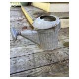 Galvanized steel watering can
