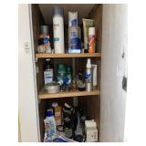 All bathroom closet contents- hair dryer, soap &