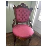 Victorian era carved wooden parlor upholstered