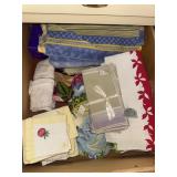 Drawer lot of table cloths and tea towels