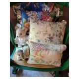 Pillows and teddy bear