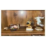 Religious Figurine, Ship Figurine, and ship in a