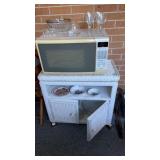White wicker TV stand with casters (no contents )