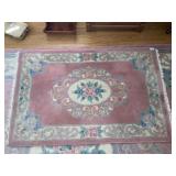 Vintage rose-pink wool area rug with fridge 43 x
