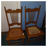 Pair of antique cane bottom press back chairs