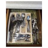 Lot of assorted flatware in divider