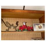 Christmas sled figurines and poinsettia