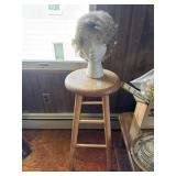 Wooden stool and foam mannequin with wig