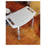 Adjustable shower stool