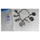 Vintage sterling charm bracelet w/ 7 charms -