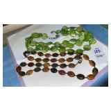 (2) vintage necklaces- green multi-strand & brown