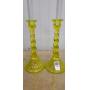 Set of yellow glass candle stick holders