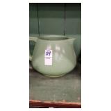 Green pottery pitcher