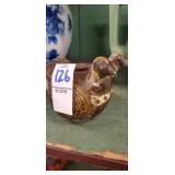 Double headed bird pottery piece