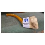 Carved face pipe