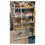 Walking stick and concrete rake and outdoor tools