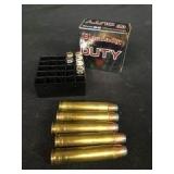 6 Rds. 9mm & 5 Rds. .450 Marlin