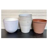 9 Assorted Plastic Planters 10'X10'