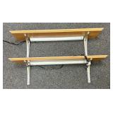 A Pair of Wall-Mounted Wood Laminate Shelves with