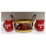 A Pair of Ceramic Hand-Warmer Mugs and a Decorativ