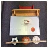 A Group of Wall Shelves and a Fire Away Sports Bas