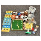 An Assortment of Sports Themed Home Decor and Toys