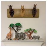 A Collection of Safari Themed Decor and Plastic An