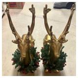 A Pair of Large Decorative Seated Gold Reindeer Fi