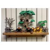 A Collection of Safari Themed Plastic Toy Animals