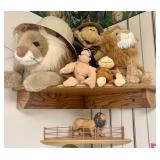 A Collection of Safari Themed Plush Figures and Mo