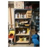 A Metal Utility Shelving Unit with an Assortment o