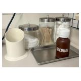 A Collection of Vintage Medical Storage Jars and S