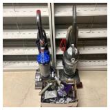 Two Upright Vacuums and an Assortment of Attachmen
