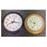 A Pair of Sterling & Noble Clock Company Wall Cloc