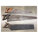 A Trio of Vintage Hand Saws Including Disston and