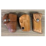 Three Vintage Leather Handgun Holsters and Magazin