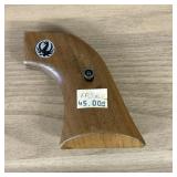 A Single Wood Handgun Grip Panel for a Ruger XR3-R