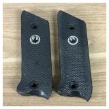 A Group of Black Checkered Synthetic Pistol Grip P