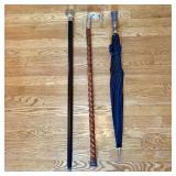 A Trio of Items Including Two Walking Canes and On