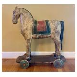 Large Carved Wooden Horse on Wheeled Platform