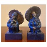 A Pair of Heavy Asian Themed Cast Resin Figurines