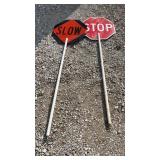 Two Slow/Stop Signs On Fiberglass Poles Two Slow/Stop Signs On Fiberglass Poles