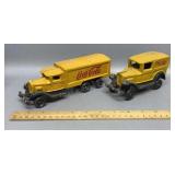 Pair of Coca Cola Cast Iron Trucks