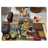 Swivel Sticks, Perfume, Cameras, Glass and More