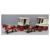 Pair of Cast Iron Milk Wagons