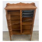 Pine cabinet for storage needs a wheel