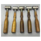 Five antique gun powder measures