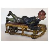 Vintage Tin Sleigh Rider Friction Toy